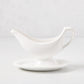 Toscana white ceramic sauce/gravy boat with integrated handle and attached oval plate.