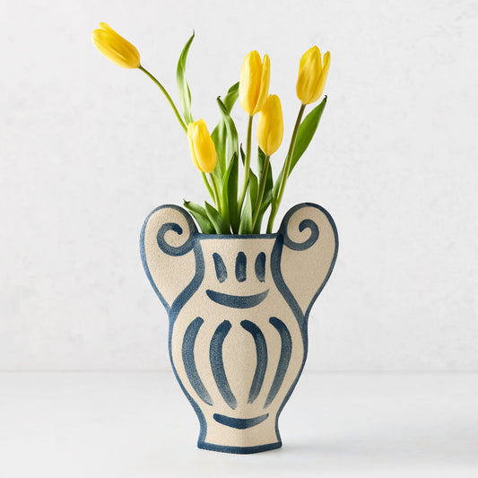 Trompe-L'oeil N1 Krater stoneware vase, 12.6"H, with raw texture and hand-painted blue Greek-inspired detailing, holding yellow tulips.