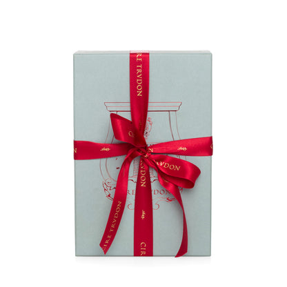 Trudon Cyrnos Scented Room Spray gift box, light blue with red ribbon and gold logo.