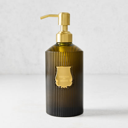 Trudon Medie 350ml liquid hand soap in a ribbed dark green glass bottle with a gold pump and label.