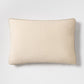 Khaki lumbar pillow in Belgian linen and velvet with a gusseted edge, 20x14 inches.