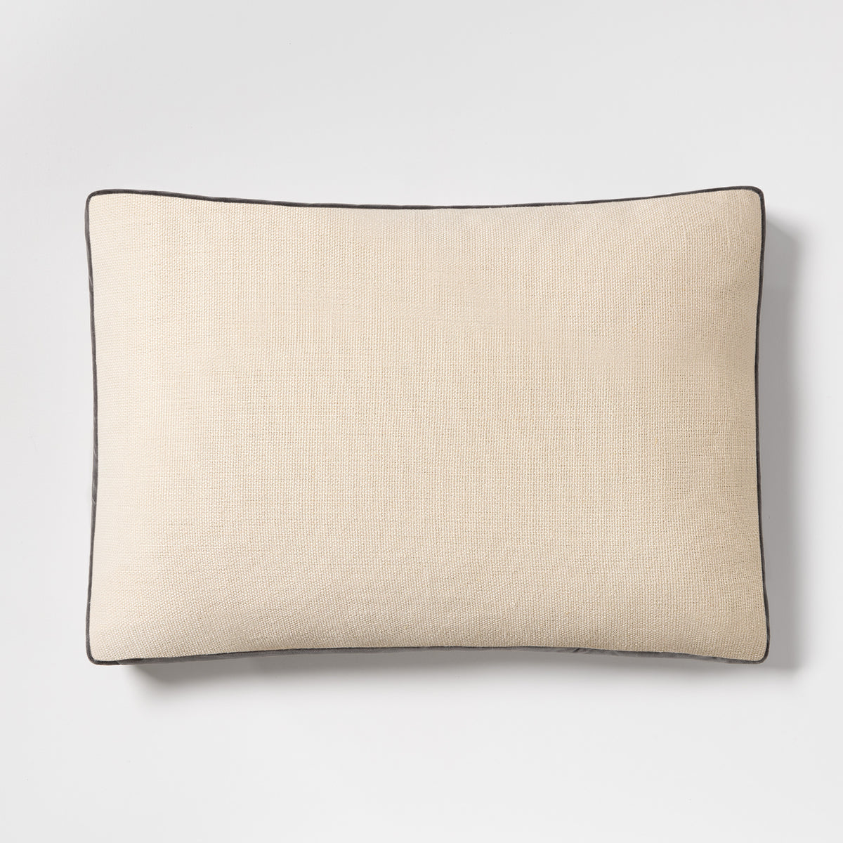20x14 inch lumbar pillow in beige Belgian linen with gray velvet gusset trim and flange detail.