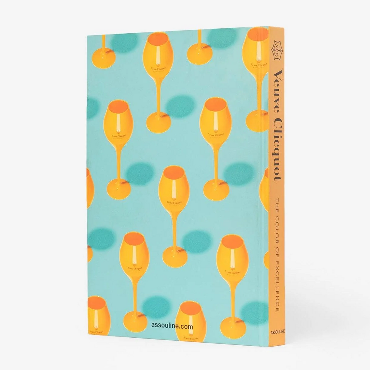 Veuve Clicquot Assouline hardback book with orange champagne glasses on a light blue cover.