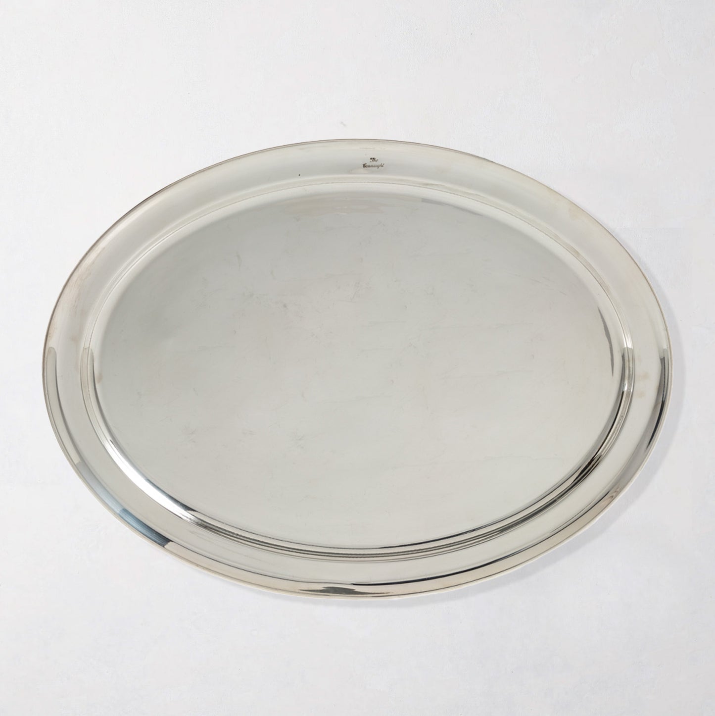 Vintage Connaught Hotel oval silverplate platter with a polished finish.