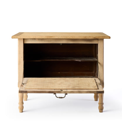 Vintage bleached oak console with a drop-down cabinet door, interior shelf, and brass pull handle.