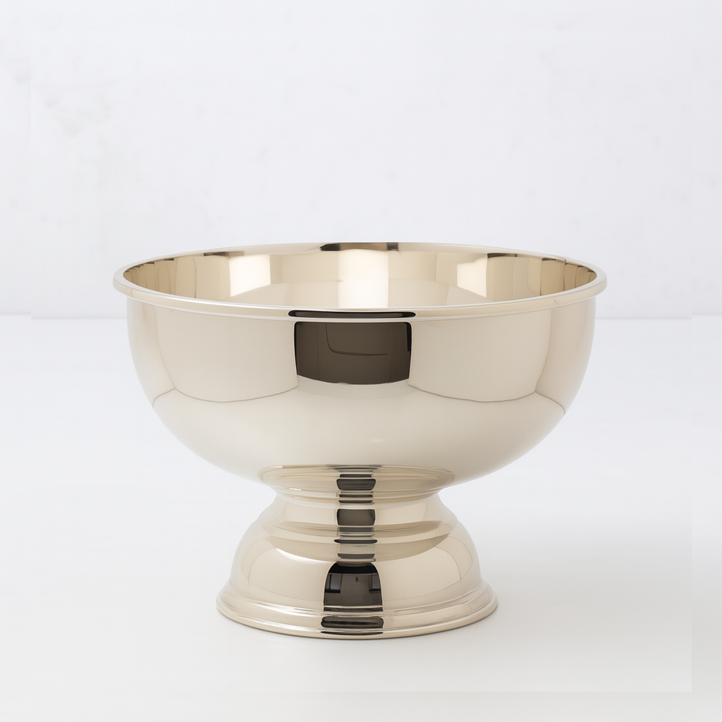 Vintage silverplate 8" footed bowl with a polished, reflective finish and classic design.
