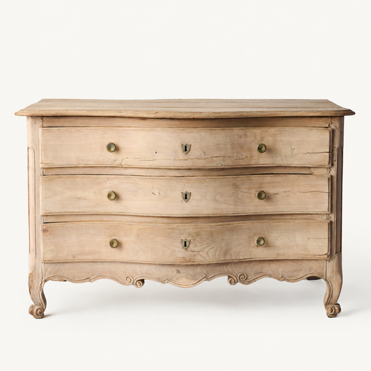 Vintage Italian natural oak chest with three drawers, brass knobs, and carved cabriole legs on a white background.