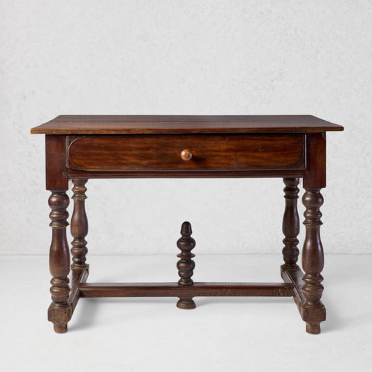 Vintage Louis XII style wooden desk with a single drawer, turned legs, and a rich, dark wood finish.