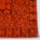 Vintage red wool runner rug with a low-pile, handcrafted geometric pattern and faded, distressed texture.