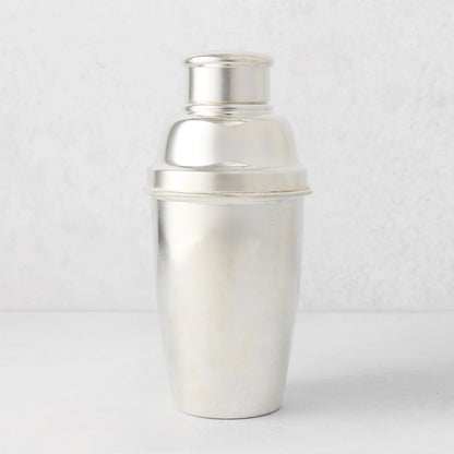 Vintage silverplate Aveline cocktail shaker with a ribbed band, shiny finish.