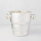 Vintage silverplate Behr champagne bucket with decorative handles.