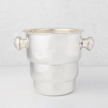 Vintage silverplate Behr champagne bucket with decorative handles.