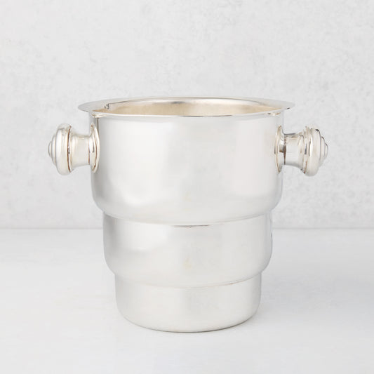 Vintage silverplate Behr champagne bucket with decorative handles.