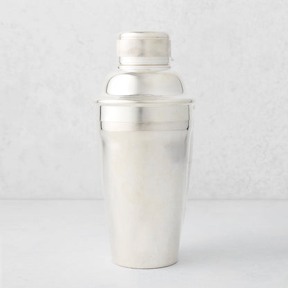Vintage silverplate Carrie cocktail shaker with ribbed cap.