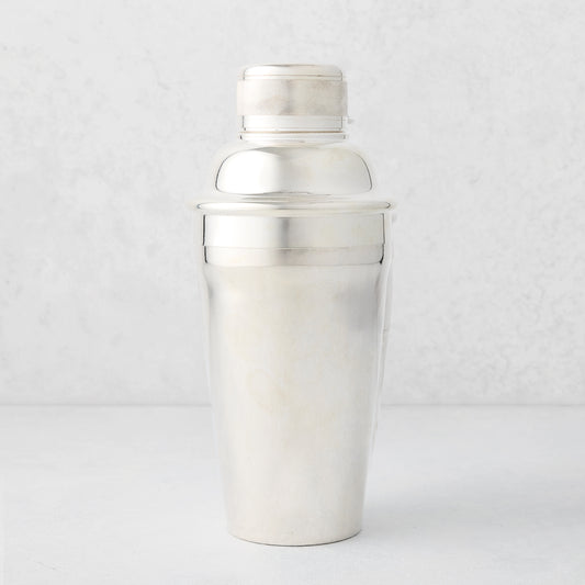 Vintage silverplate Carrie cocktail shaker with ribbed cap.