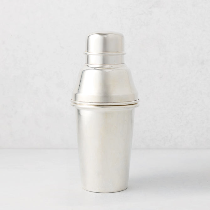 Vintage silverplate Celine cocktail shaker with a polished finish.