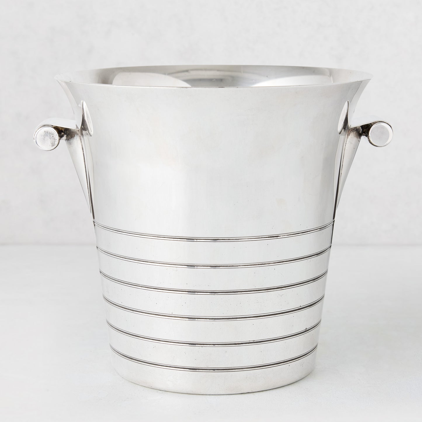 Vintage silverplate Deco lined champagne bucket with two handles.