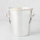 Vintage silverplate Delaney ice bucket with decorative border edge and ornate handles.