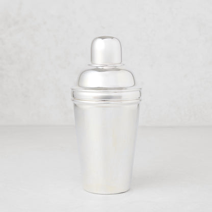 Vintage silverplate Estrella cocktail shaker, shiny, three-piece design.