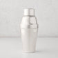 Vintage silverplate Hallie cocktail shaker with a shiny, smooth finish.