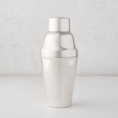 Vintage silverplate Hallie cocktail shaker with a shiny, smooth finish.