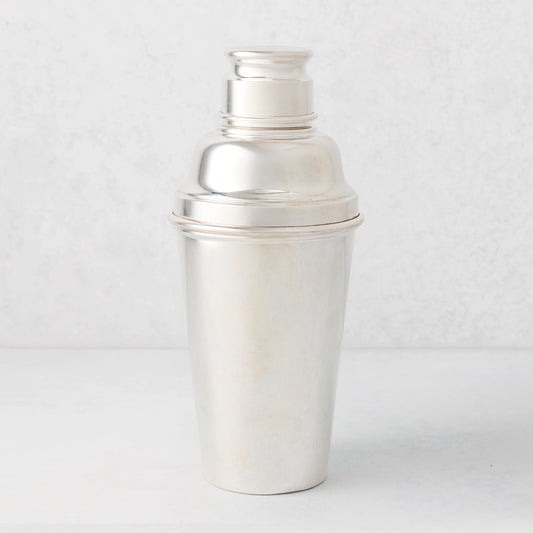 Vintage silverplate Inez cocktail shaker, shiny silver metal with a classic three-piece design.