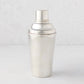 Vintage silverplate cocktail shaker with ivy design.