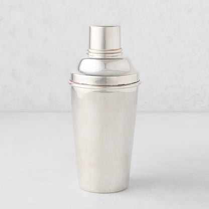 Vintage silverplate cocktail shaker with ivy design.