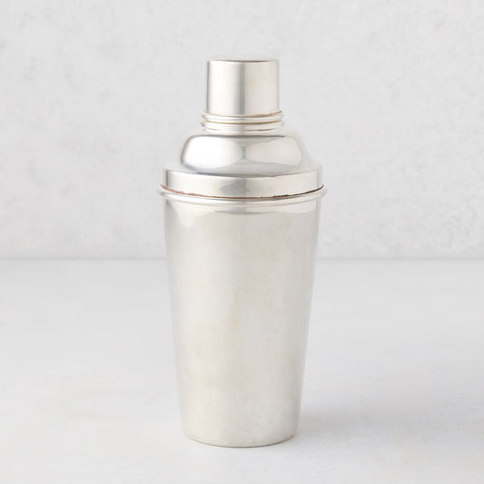 Vintage silverplate cocktail shaker with ivy design.