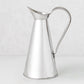 Vintage silverplate James pitcher, 11 inches tall, with a conical body and curved handle.