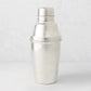 Vintage silverplate Jules cocktail shaker with lid, classic design.