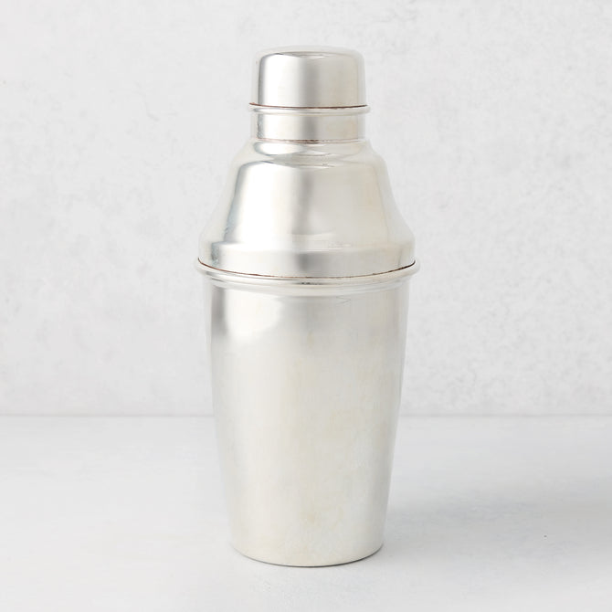 Vintage silverplate Jules cocktail shaker with lid, classic design.