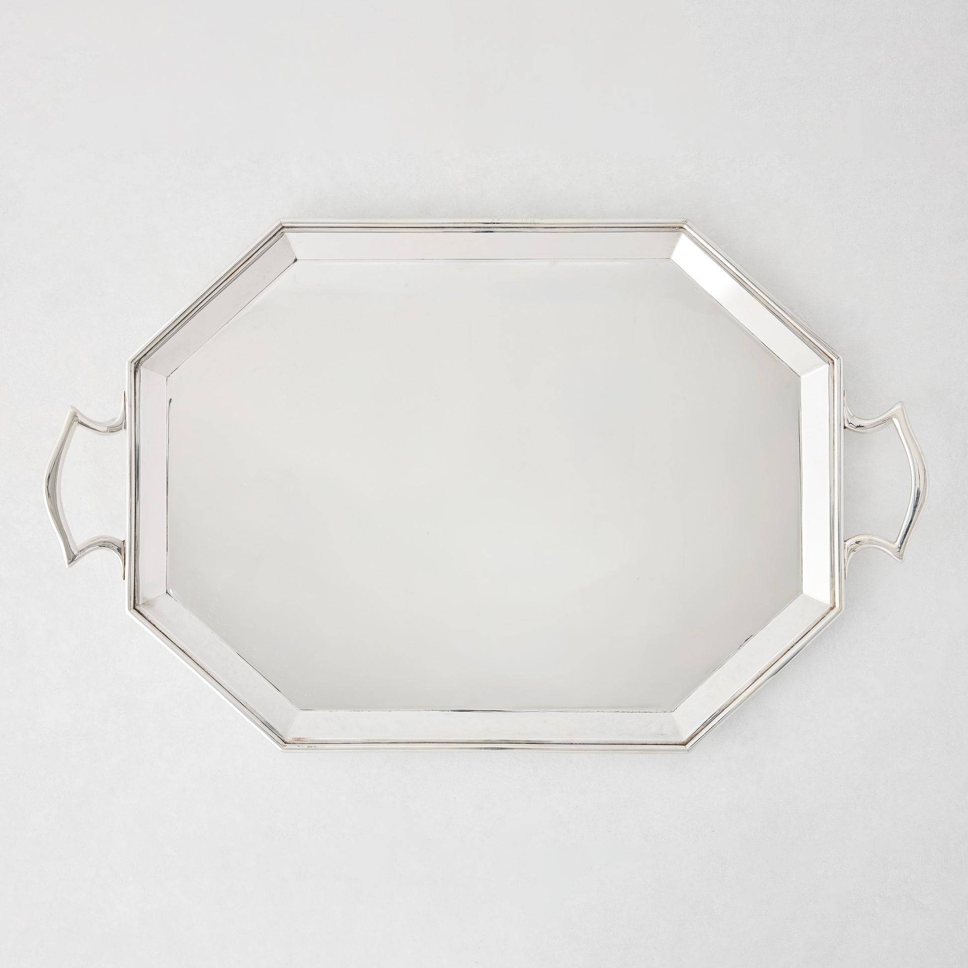 Vintage silverplate large Jake tray with an octagonal shape and two handles.