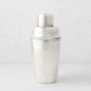 Vintage silverplate Leonor cocktail shaker with hammered texture.