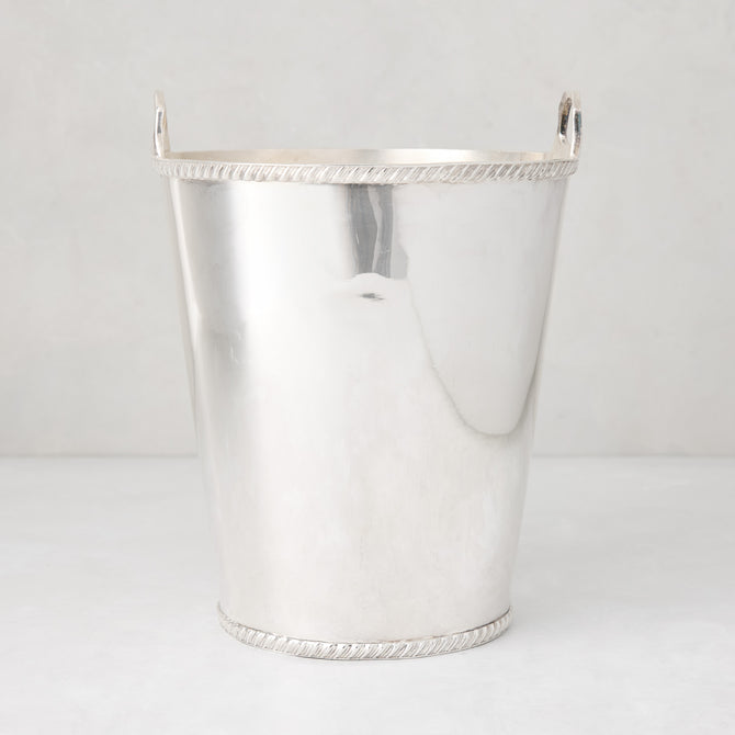 Vintage silverplate Margot champagne bucket with side handles and rope-style trim detail.
