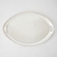 Vintage silverplate oblong Leela angled tray with ornate handles.