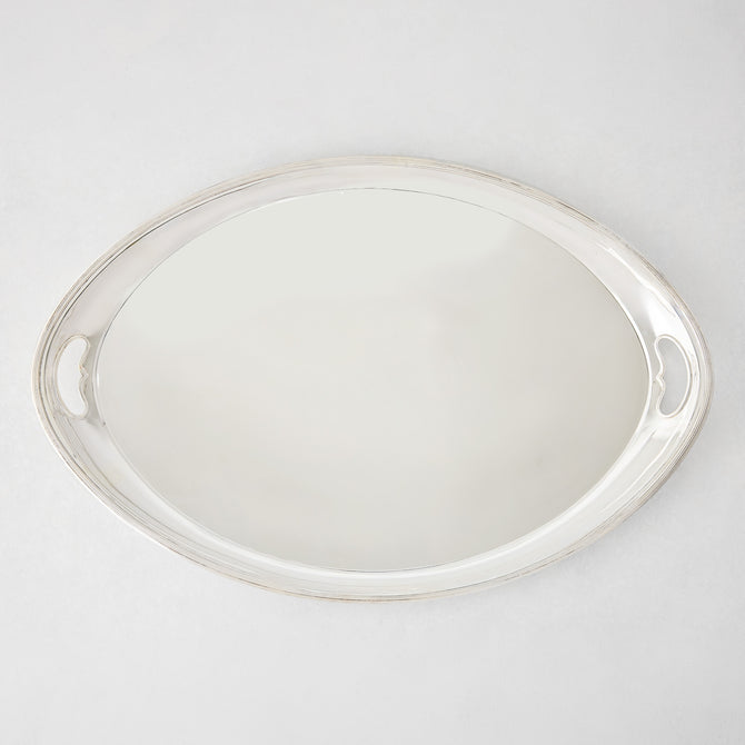 Vintage silverplate oblong Leela angled tray with ornate handles.