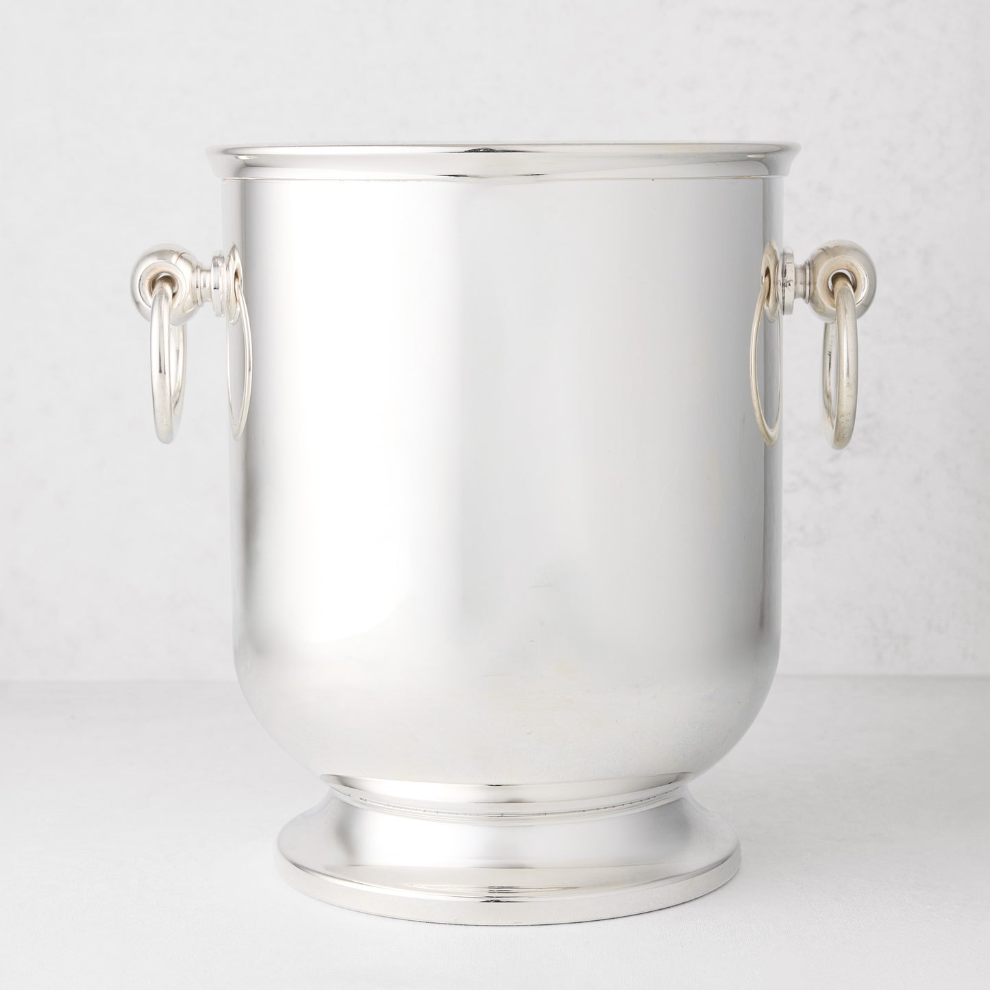 Vintage silverplate olive champagne bucket with ring handles.