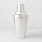 Vintage silverplate Ophelia cocktail shaker, sleek and polished, with a ribbed cap.