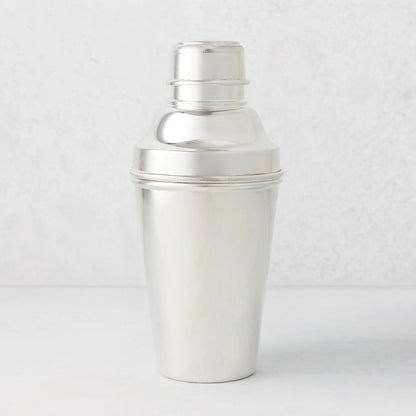 Vintage silverplate Ophelia cocktail shaker, sleek and polished, with a ribbed cap.