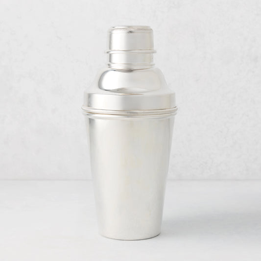 Vintage silverplate Ophelia cocktail shaker, sleek and polished, with a ribbed cap.