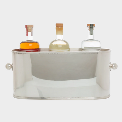 Vintage silverplate oval 4-bottle ice bucket with ball handles, holding three liquor bottles.