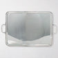 Vintage rectangular silverplate handled serving tray with polished finish.