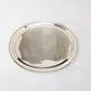Vintage silverplate oval platter with a polished, reflective surface and simple double-rim design.