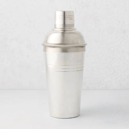 Vintage silverplate Sloane cocktail shaker with a classic design and subtle patina.