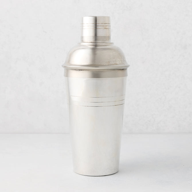 Vintage silverplate Sloane cocktail shaker with a classic design and subtle patina.