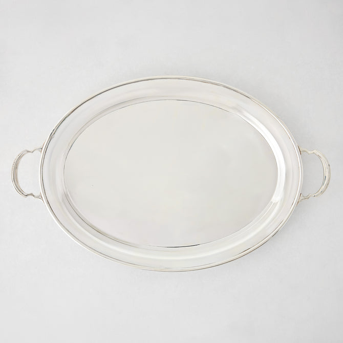 Vintage silverplate Sofia oval tray, 23 inches, with handles and a shiny finish.