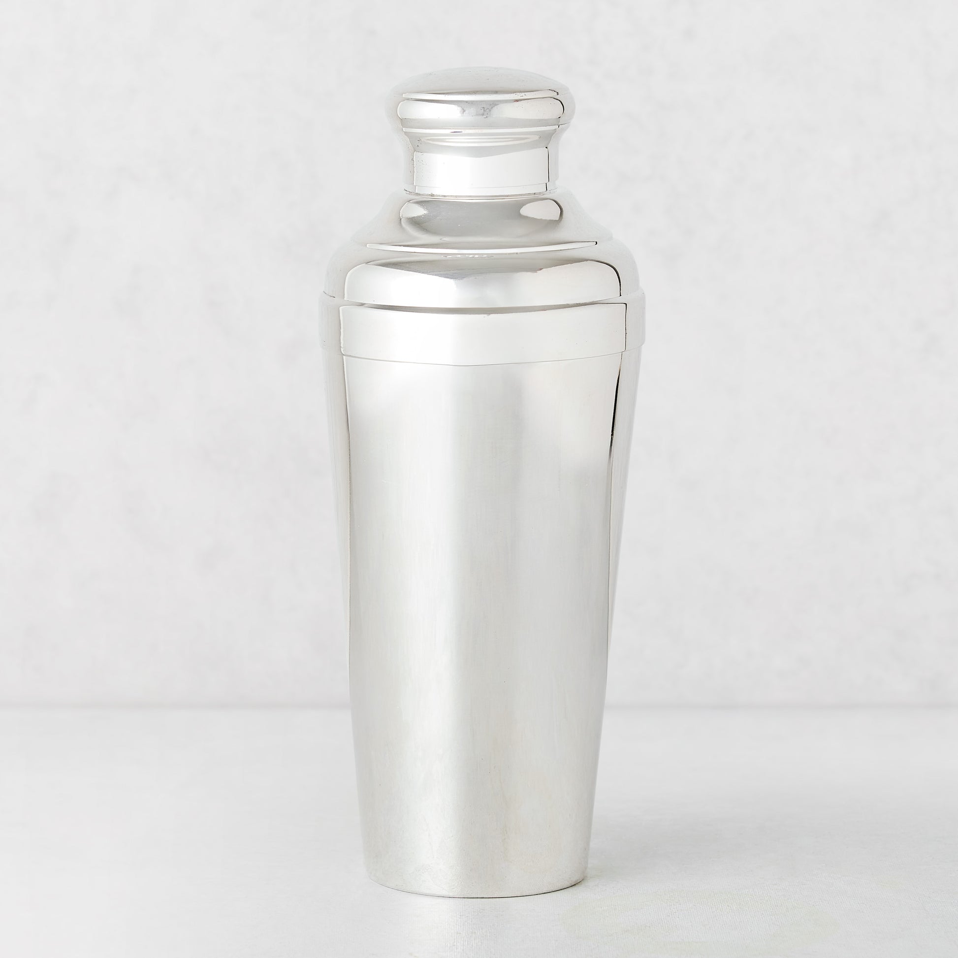 Vintage silverplate tall Reece cocktail shaker with a polished finish.