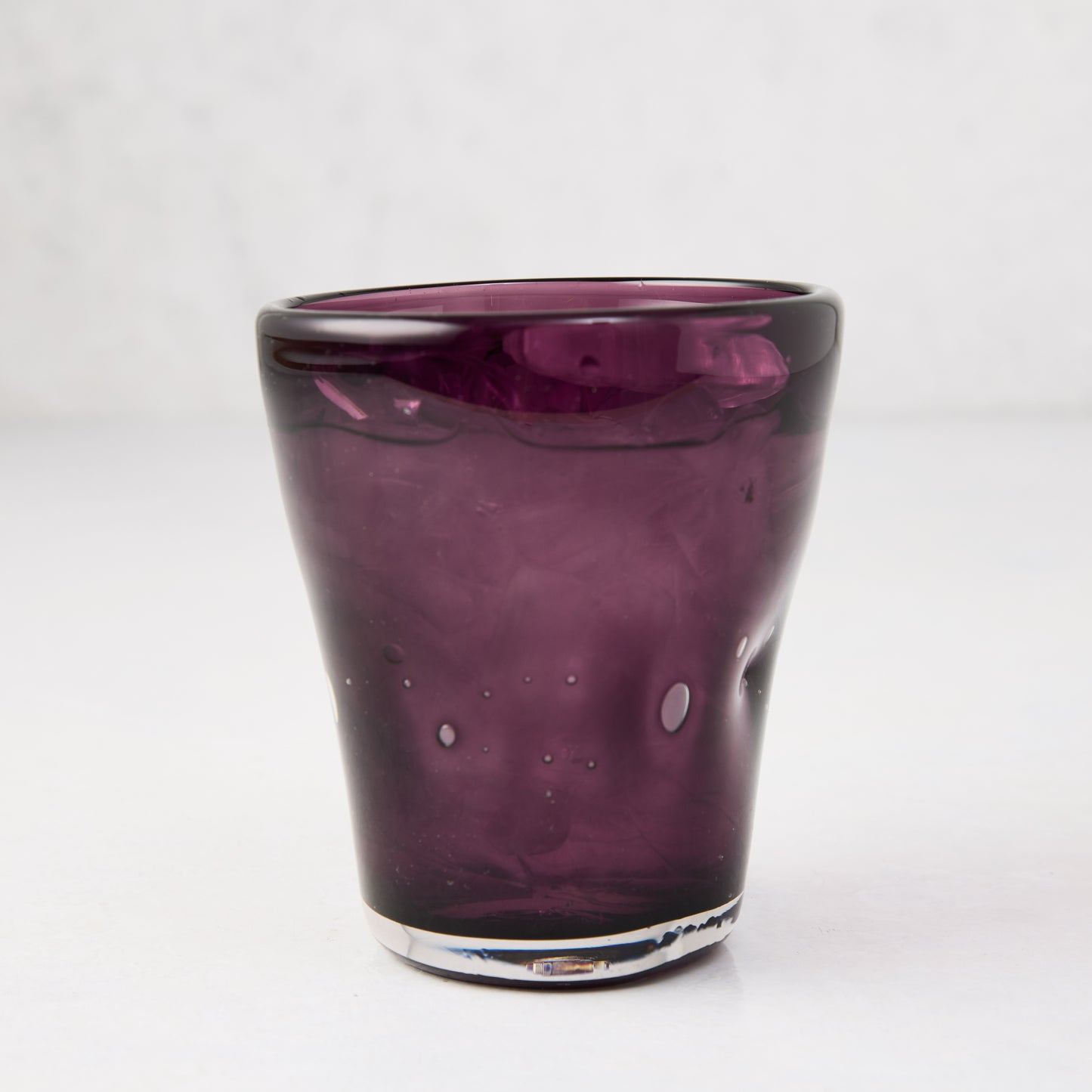 Violet Henri 8 oz. mouth-blown glass with unique imperfections and small air bubbles.