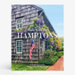 Walk with Me: Hamptons" book cover featuring a rustic shingle house with purple wisteria and an American flag.